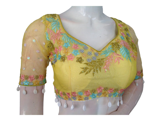 Brighten your ensemble with "Sunny Delight," our Yellow Organza Sequins Designer Readymade Saree Blouses, featuring luxurious organza and intricate sequin detailing for a radiant and stylish look.