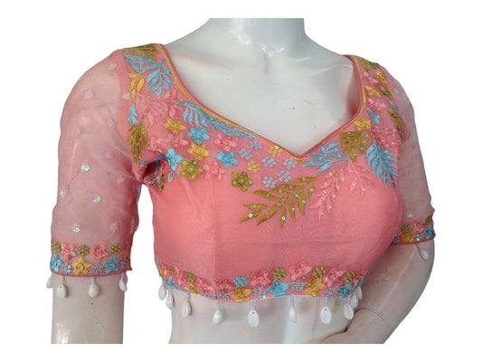 Experience elegance with "Peach Perfection," our Pink Organza Sequins Designer Readymade Saree Blouses, featuring luxurious organza and intricate sequin detailing for a sophisticated and stylish look.