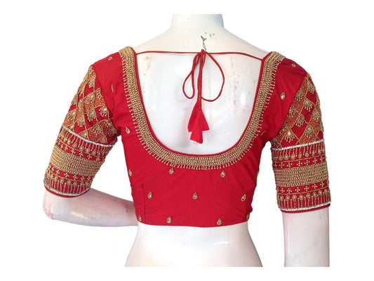 "Radiant Red: Aari Bridal Handwork Readymade Saree Blouse, featuring exquisite craftsmanship and luxurious design for your special day."