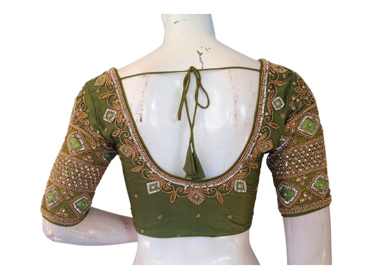 "Green Aari Hand-Embroidered Readymade Saree Blouse | Indian Craftsmanship, featuring exquisite design and meticulous detailing."