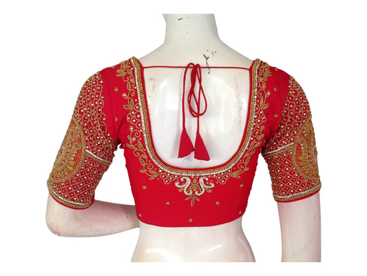 "Love in Bloom: Pinkish Red Aari Saree Blouses for the Indian Bride, featuring exquisite craftsmanship and timeless elegance."