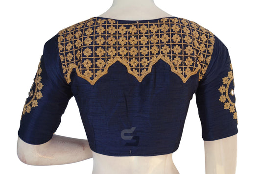 Experience designer elegance with our Navy Blue Embroidered High Neck Saree Blouse, exuding sophistication and timeless style with intricate detailing and rich hue.